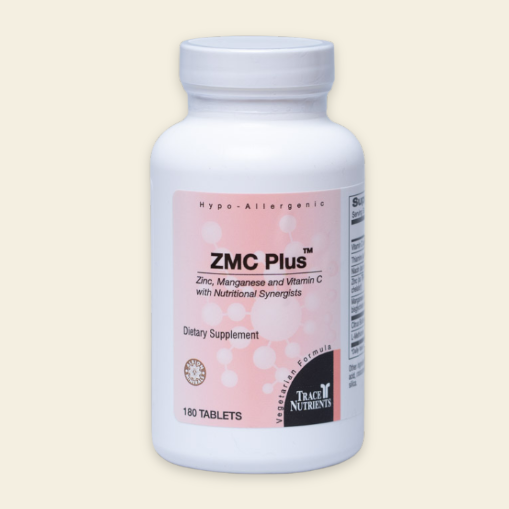 Supplement bottle labeled 'ZMC Plus' on a beige background