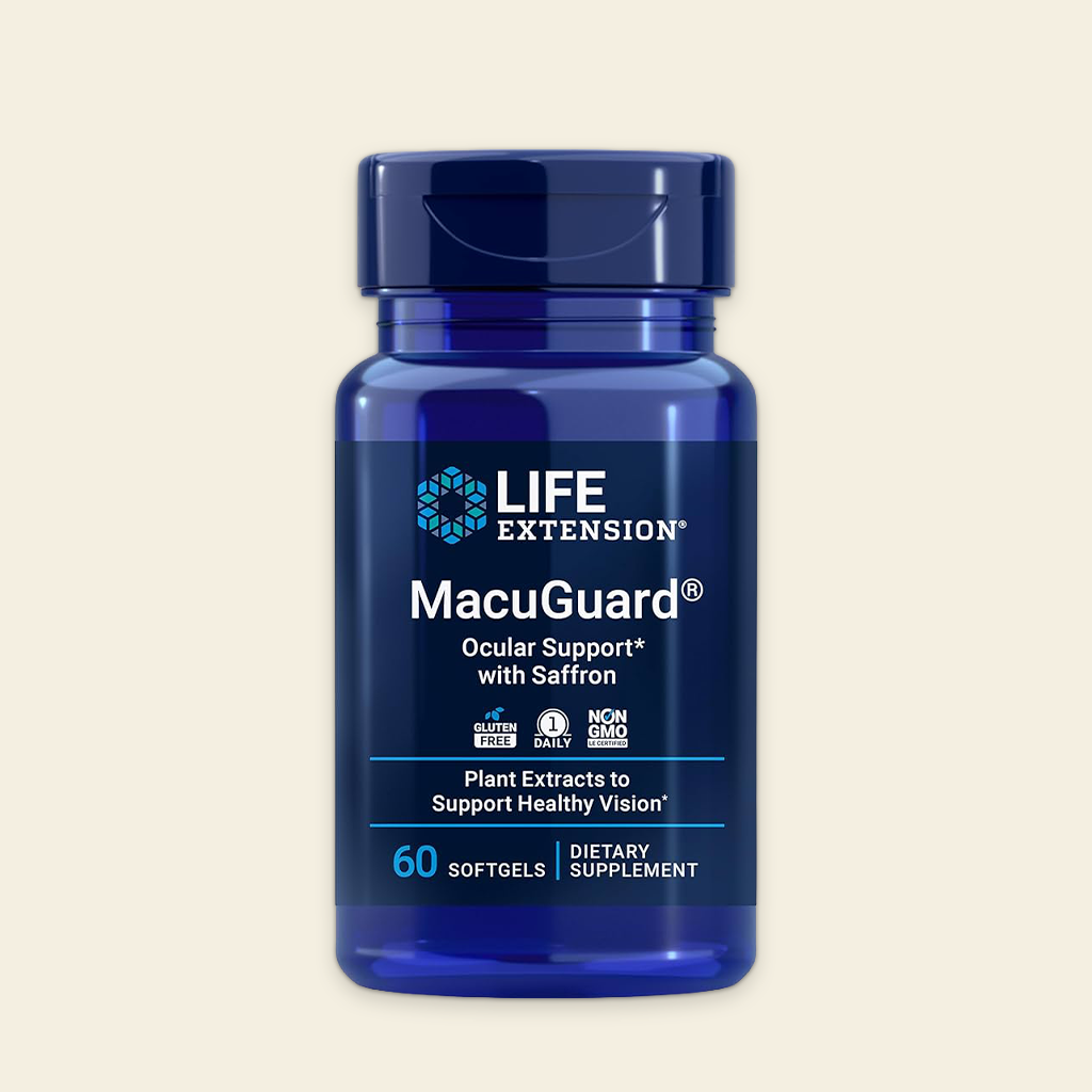 Blue supplement bottle labeled 'MacuGuard' by Life Extension on a beige background