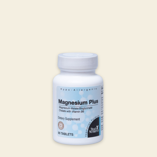 Supplement bottle labeled 'Magnesium Plus' on a beige background