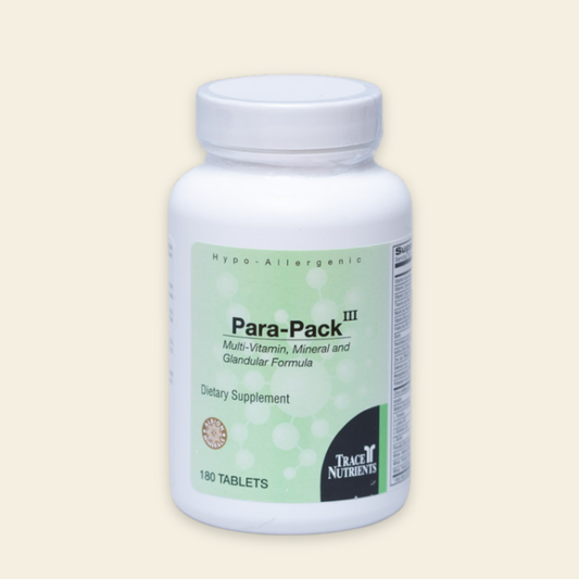Supplement bottle labeled 'Para-Pack III' on a beige background