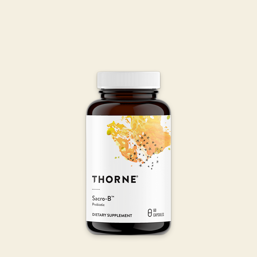 Thorne Sacro-B supplement bottle on a beige background