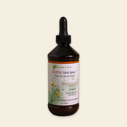 Bottle of Nature's Rite Super Neti Juice on a beige background