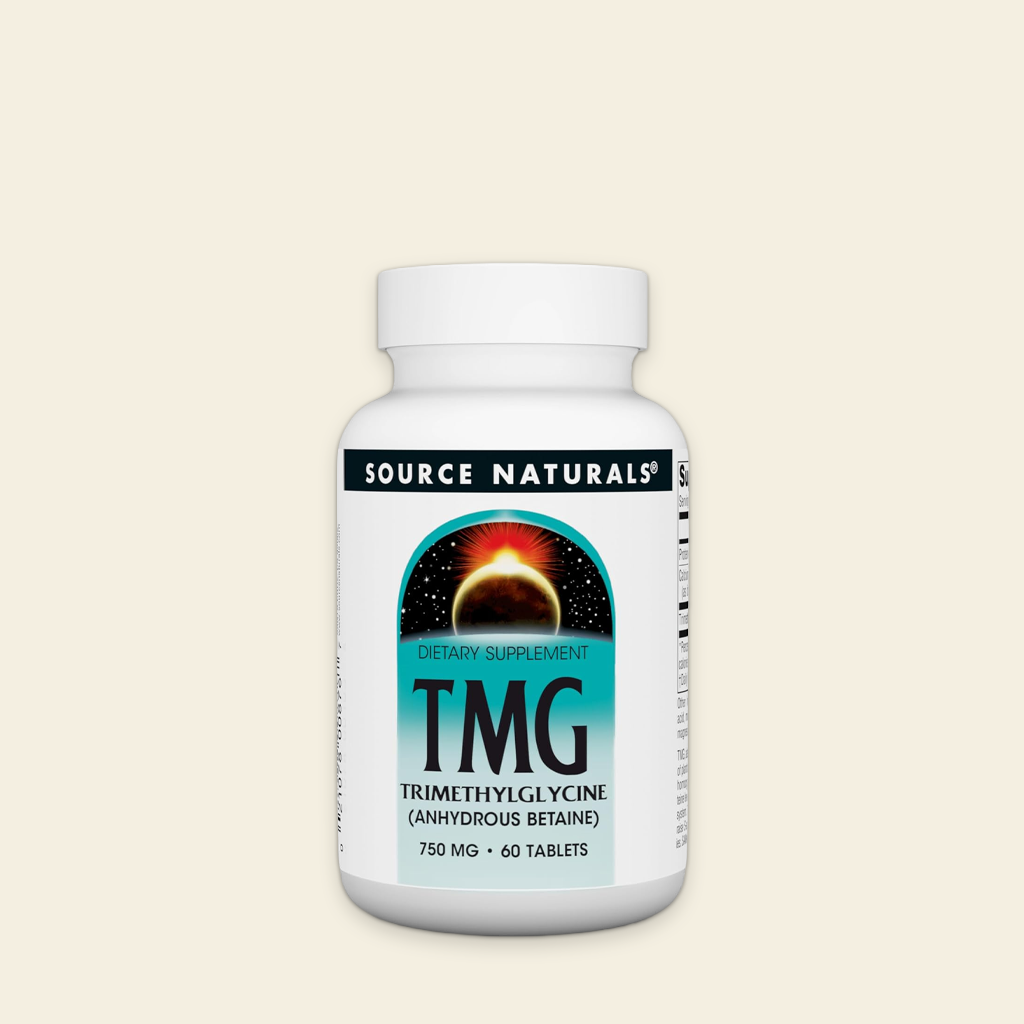 Supplement bottle labeled 'TMG' by Source Naturals on a beige background
