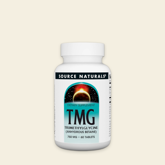Supplement bottle labeled 'TMG' by Source Naturals on a beige background
